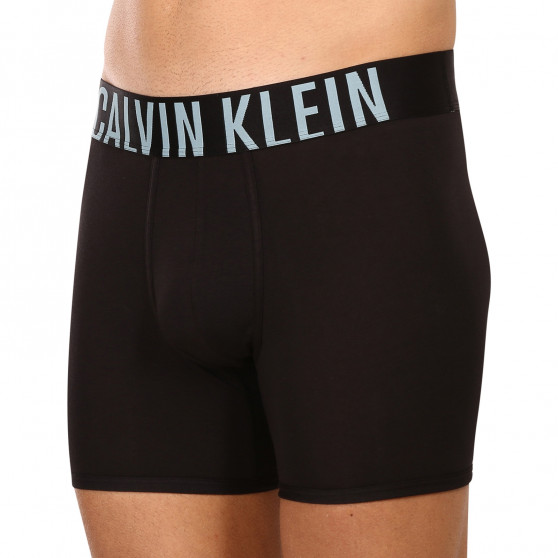 2PACK Moške boksarice Calvin Klein črne (NB2603A-6HF)