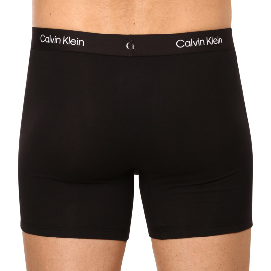 3PACK Moške boksarice Calvin Klein črne (NB3529A-UB1)