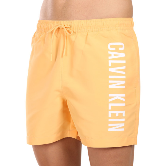 Moške kopalke Calvin Klein oranžna (KM0KM01004-SAN)